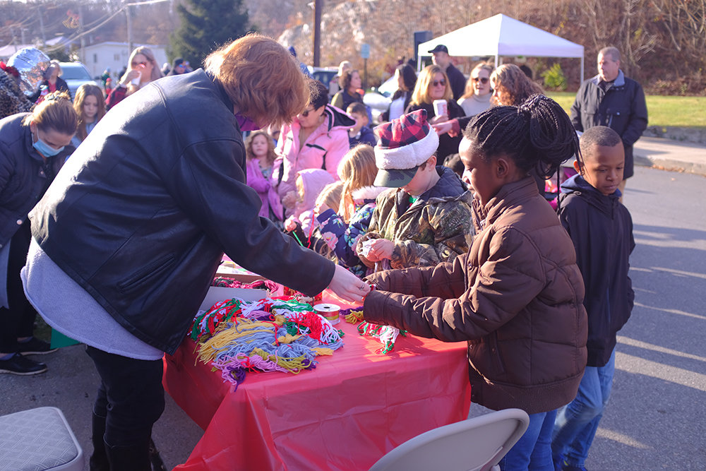 The Sarah Hull Hallock Library set out a crafts table and worked with the kids on their creations.